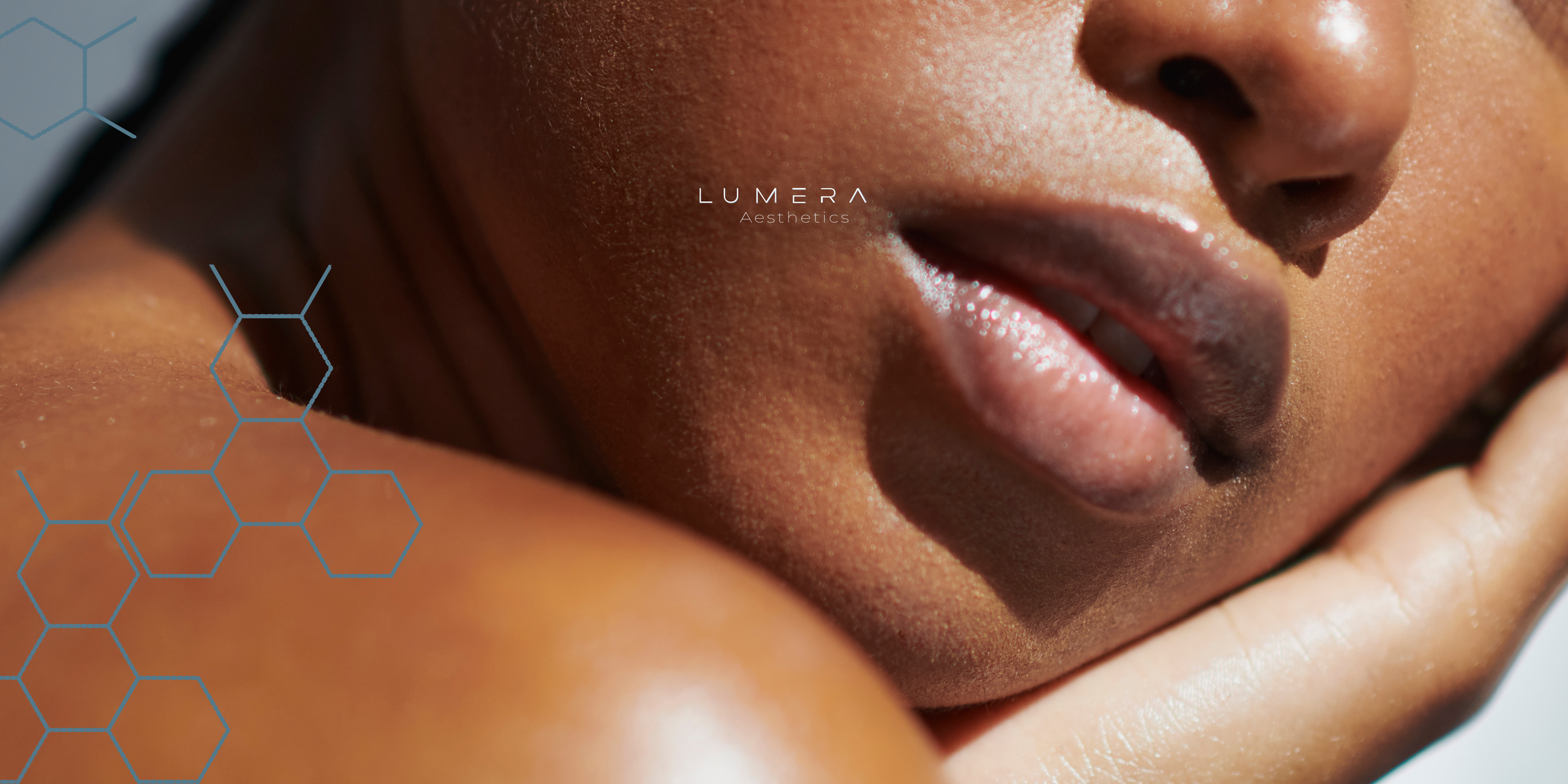 Close-up of a woman's face resting on her hand, with the focus on her lips and part of her nose, showcasing smooth skin and subtle makeup.