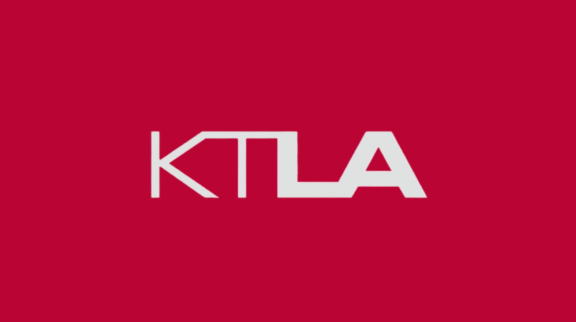 KLA logo on a red background.