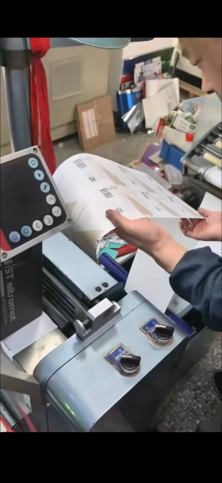 Manual in-line inspection during custom wine label production