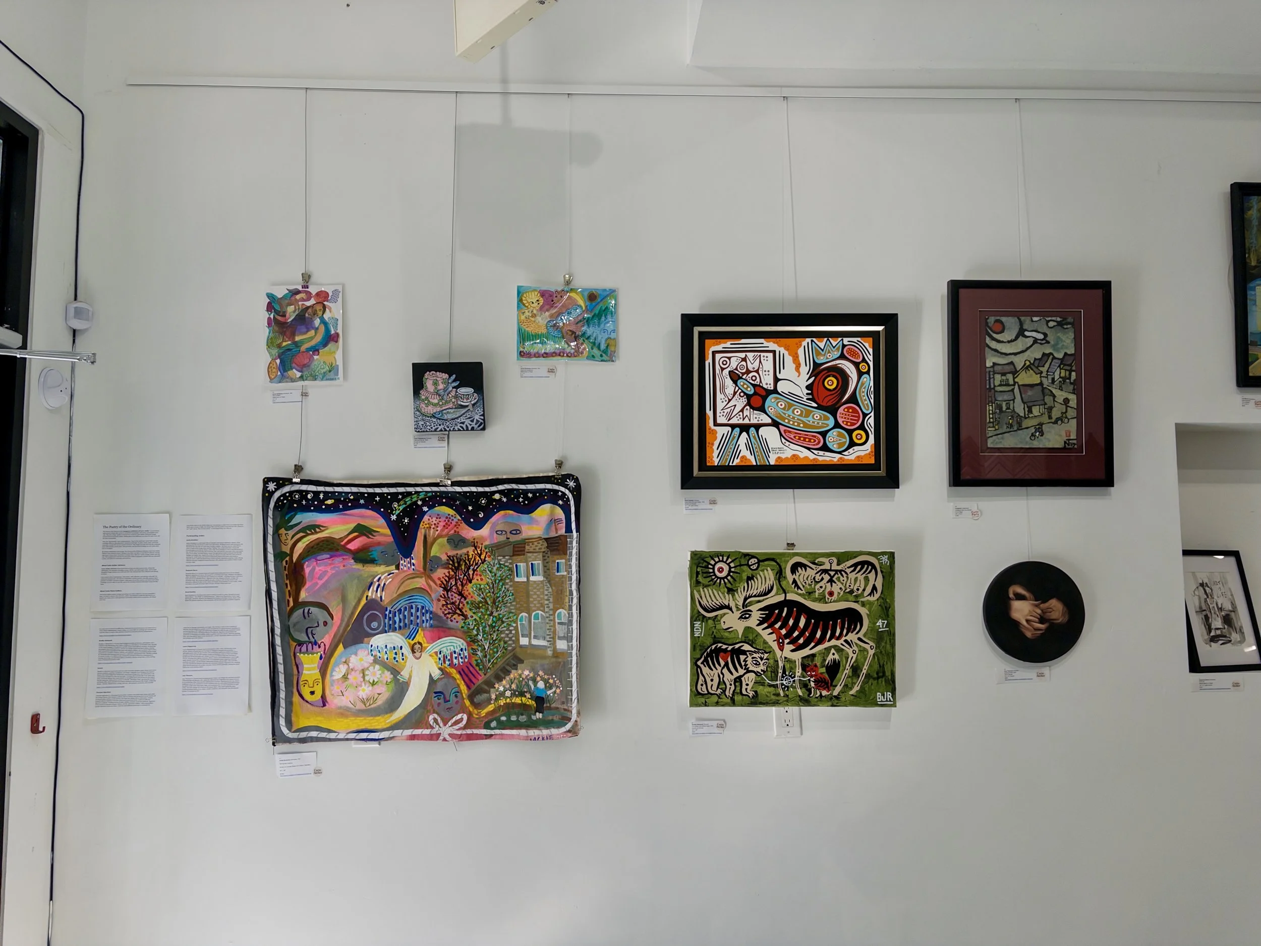 Curio Atelier Art Exhibit Wall