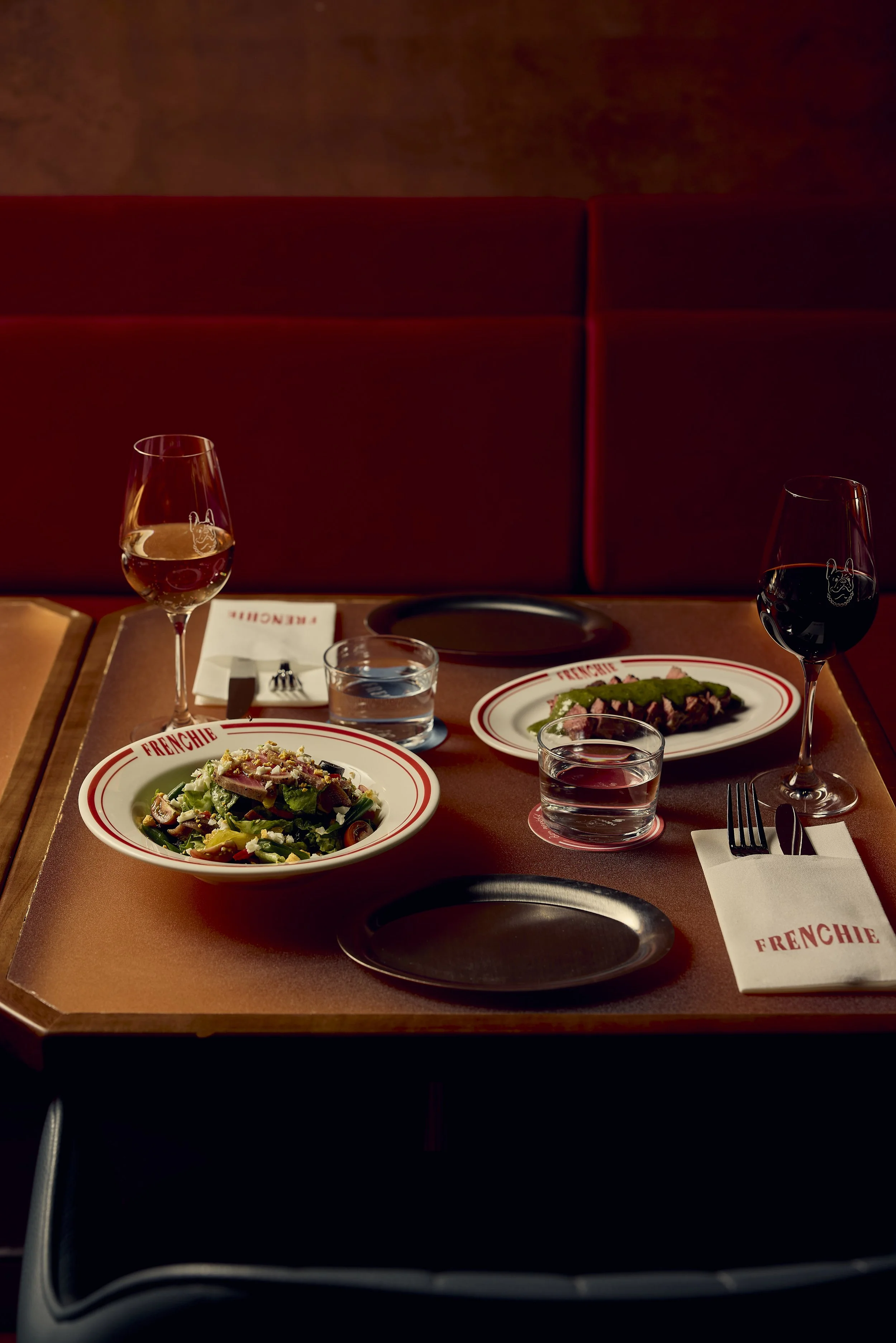 Moody red interior of Frenchie restaurant in Melbourne CBD