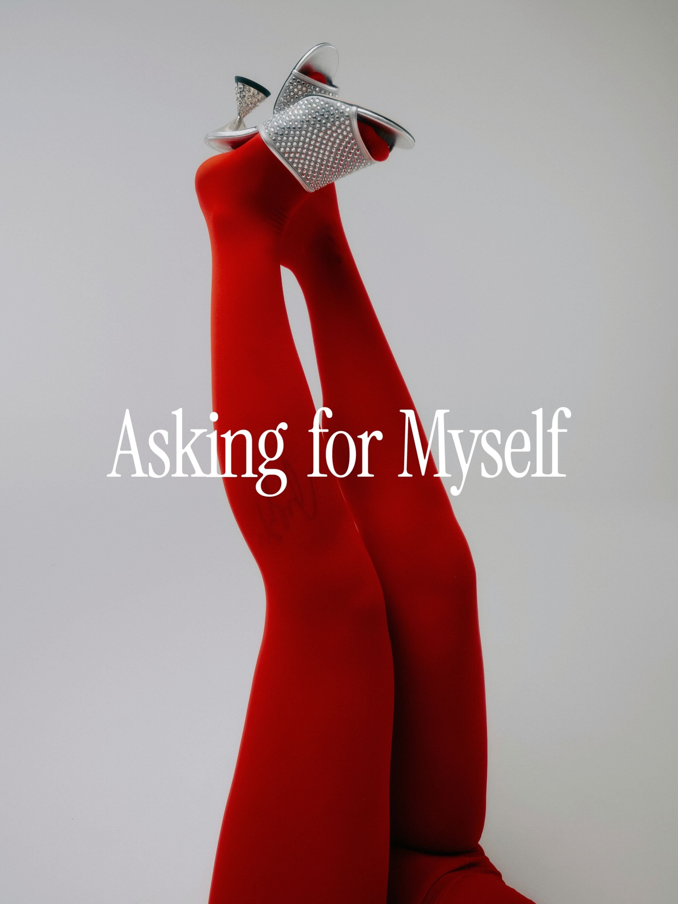 Red legs wearing red stockings with silver high-heeled shoes and accessories, with the text 'Asking for Myself' overlaid.