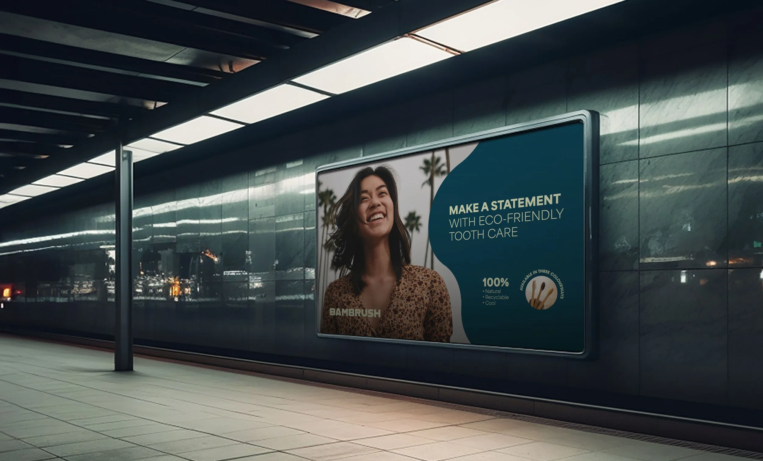 An advertisement on a train station wall promoting eco-friendly tooth care with a smiling woman, palm trees in the background, and text about natural, recyclable, and cool toothbrushes.