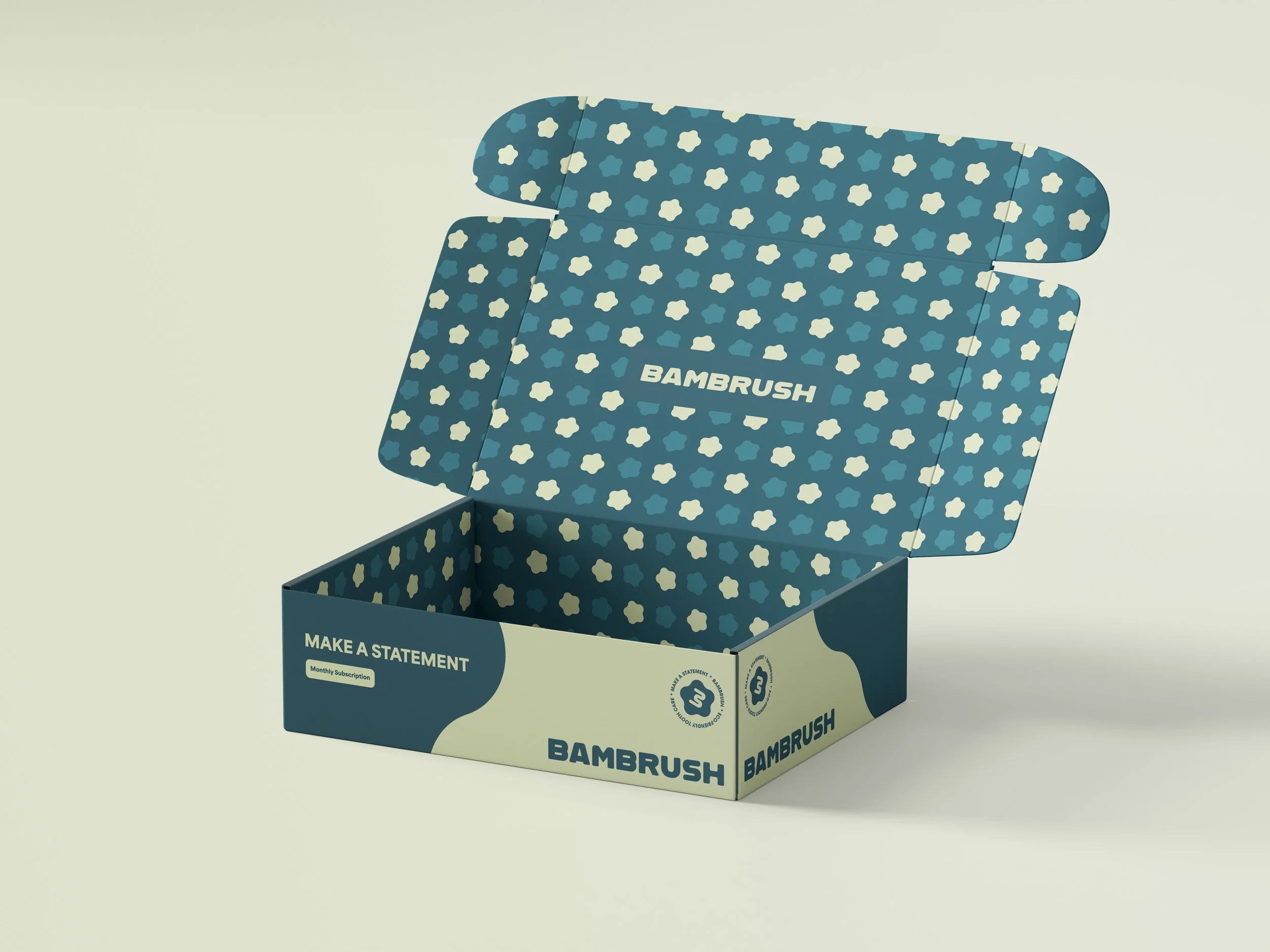 Open blue and cream Bambrush subscription box with polka dot interior and branding, featuring text that says 'Make a Statement' and 'Monthly Subscription'.