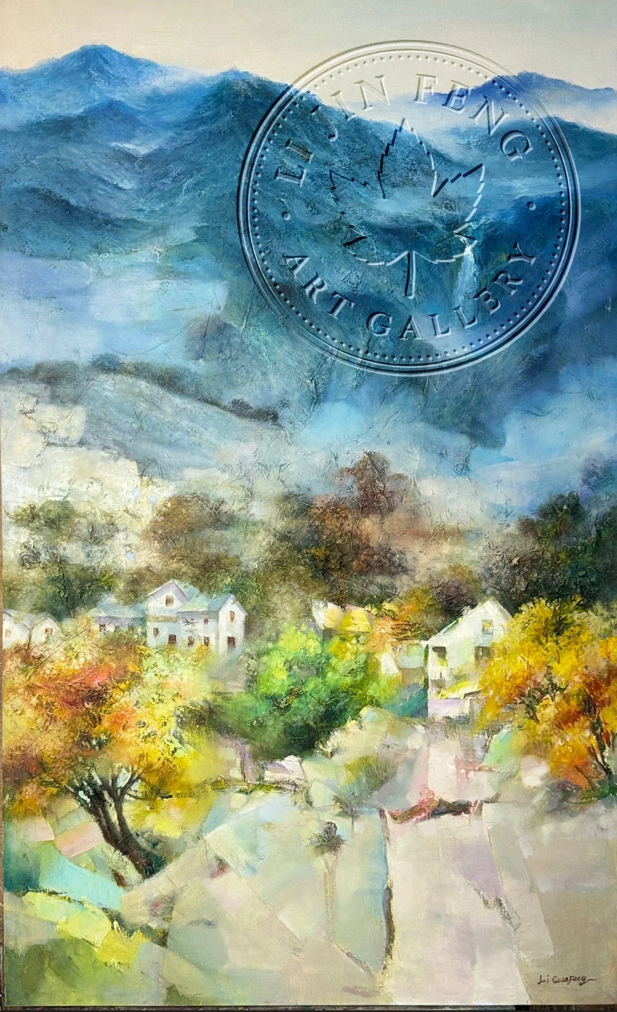 A vibrant watercolor landscape painting depicting houses, trees, and mountains, with autumn foliage in the foreground and a mountain range in the background.