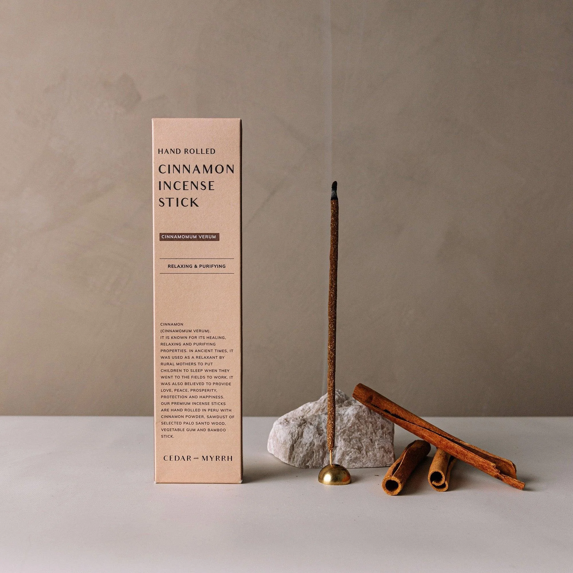 cinnamon-incense-stick-lit-with-box-and-bark.jpg