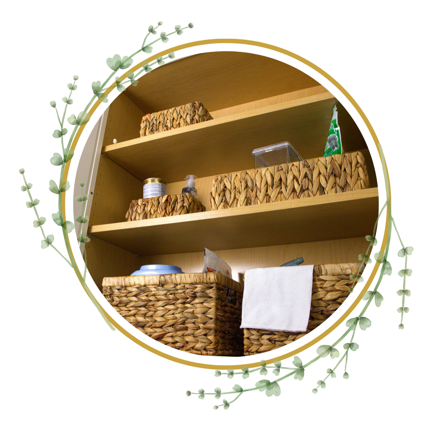 A wooden shelf unit with three shelves containing woven baskets, a container, a spray bottle, and a towel.