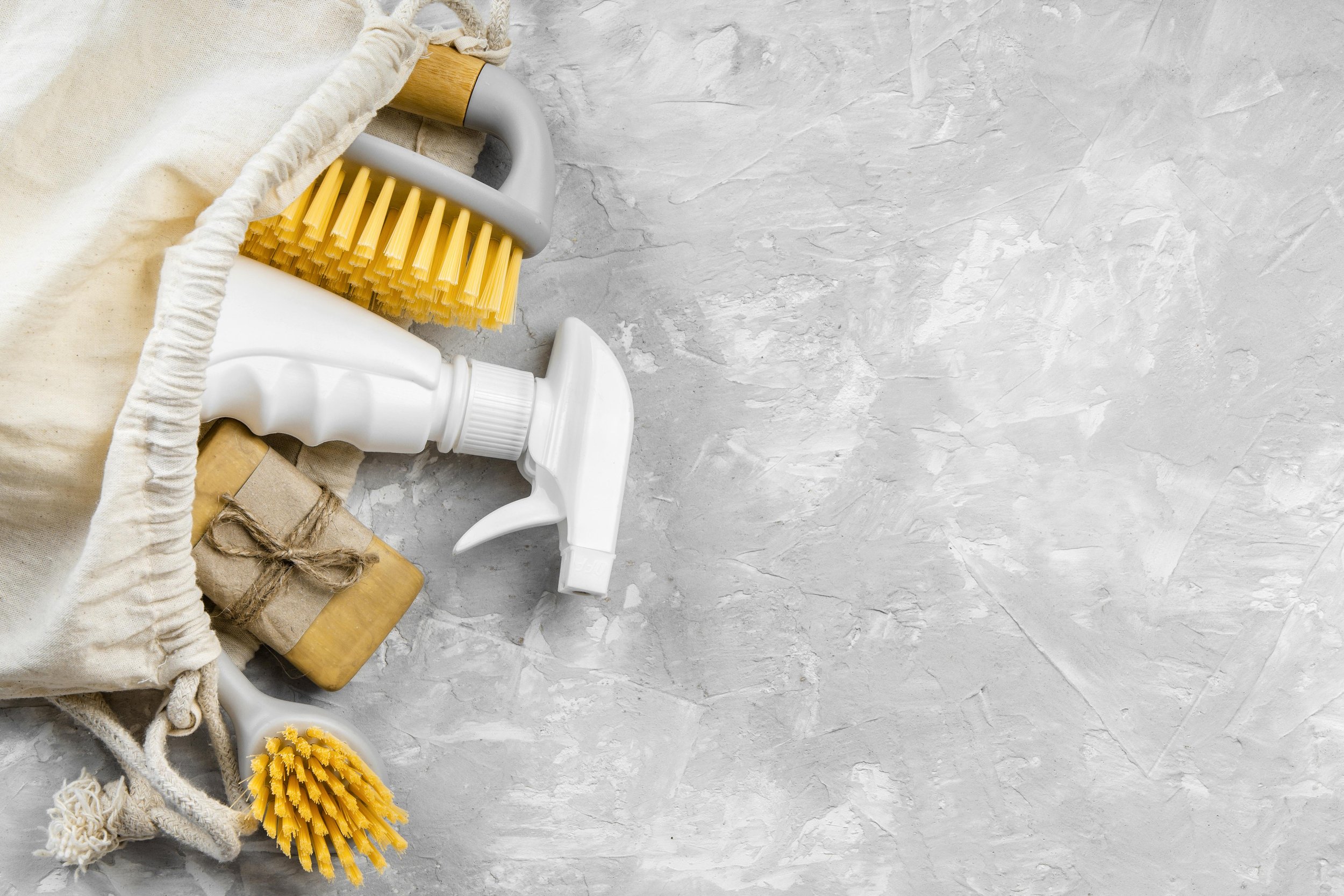 flat-lay-eco-friendly-cleaning-products-with-brushes-copy-space.jpg