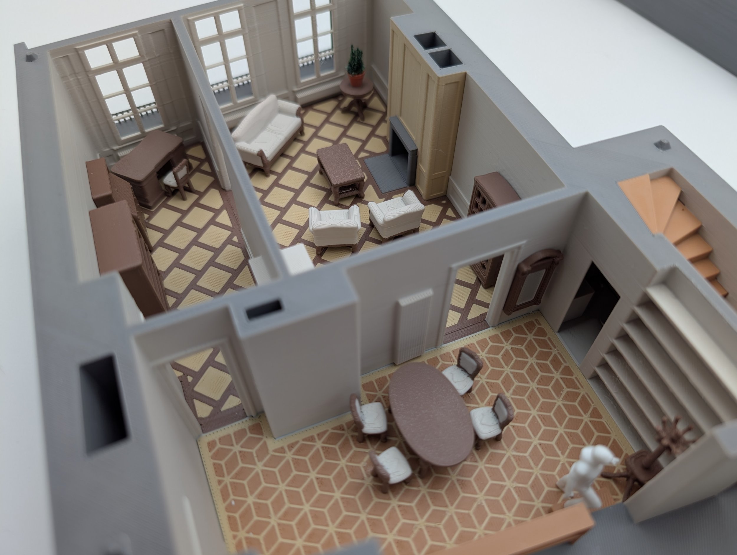 Physisches 3D-Architekturmodell: Innenvisualisierung Wohnzimmer mit gedruckter Einrichtung.