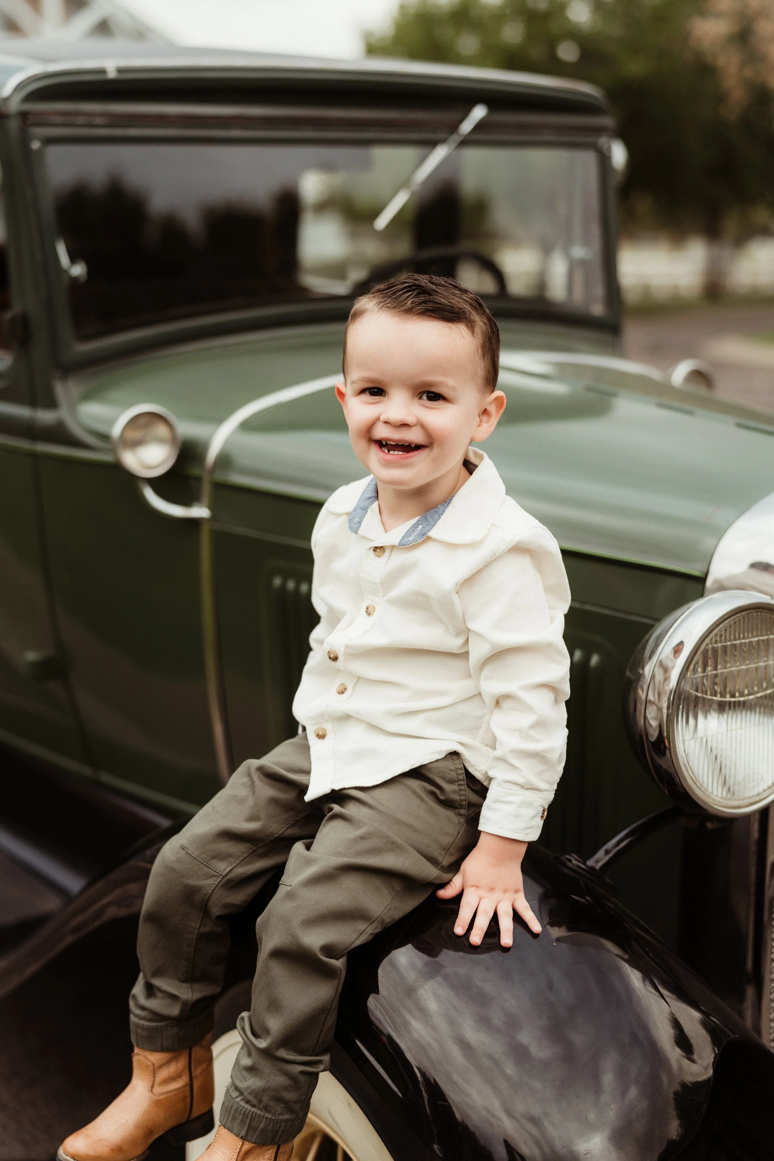 Toddler Sitting on 1931 Ford Model A During Vintage Photoshoot