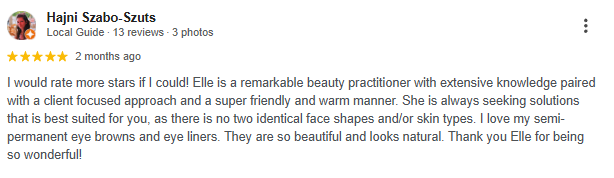 Review of Elle praising her as a beauty practitioner with brown eyes and eye liner, describing her as friendly and knowledgeable.