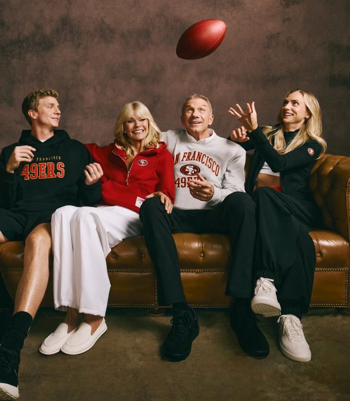 Joe Montana and family wearing San Francisco 49ers apparel in cozy lifestyle setting for Lululemon partnership campaign, showcasing multi-generational nostalgia and sports branding.