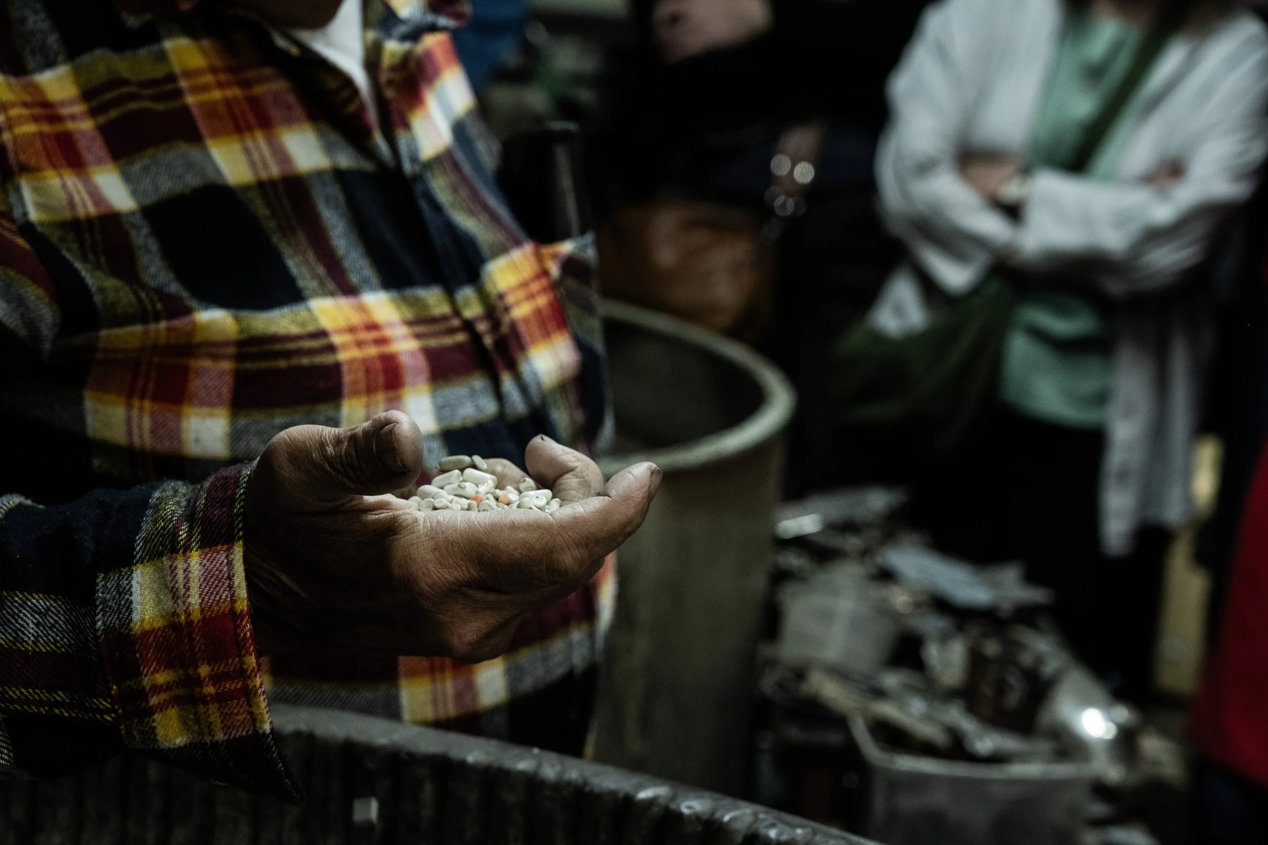 Hands of a casting workman