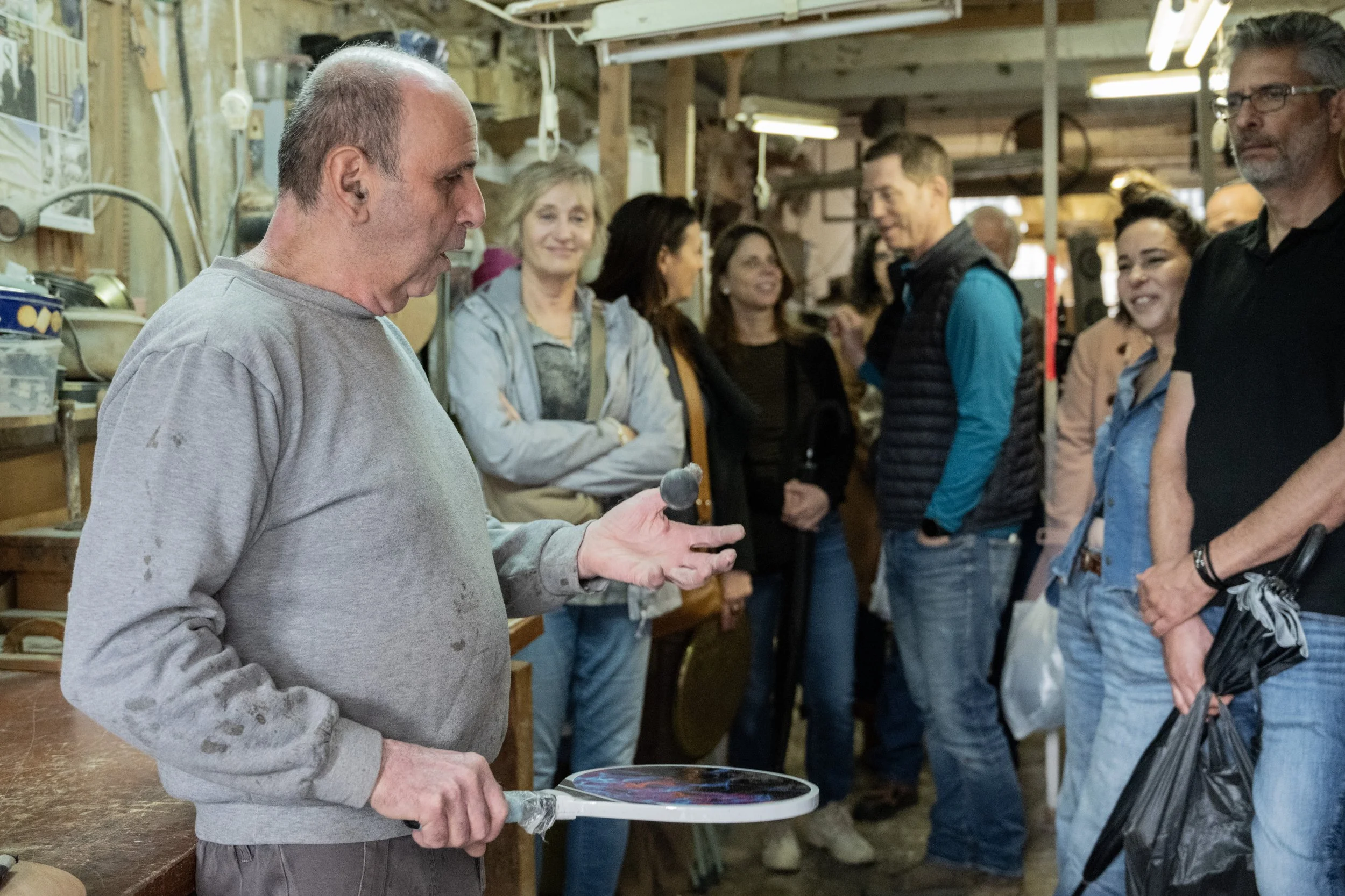 Haim Dagan holding a beach paddle