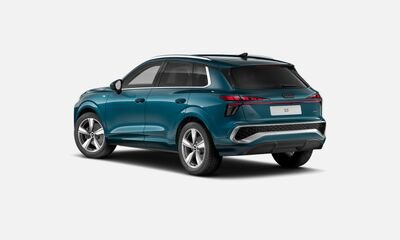 Blue compact SUV viewed from the rear three-quarter angle.