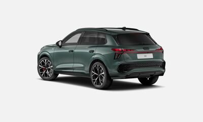 Green SUV parked on a plain white background.