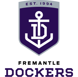 An emblem with a navy blue shield featuring a white anchor and the word 'DOCKERS' below.