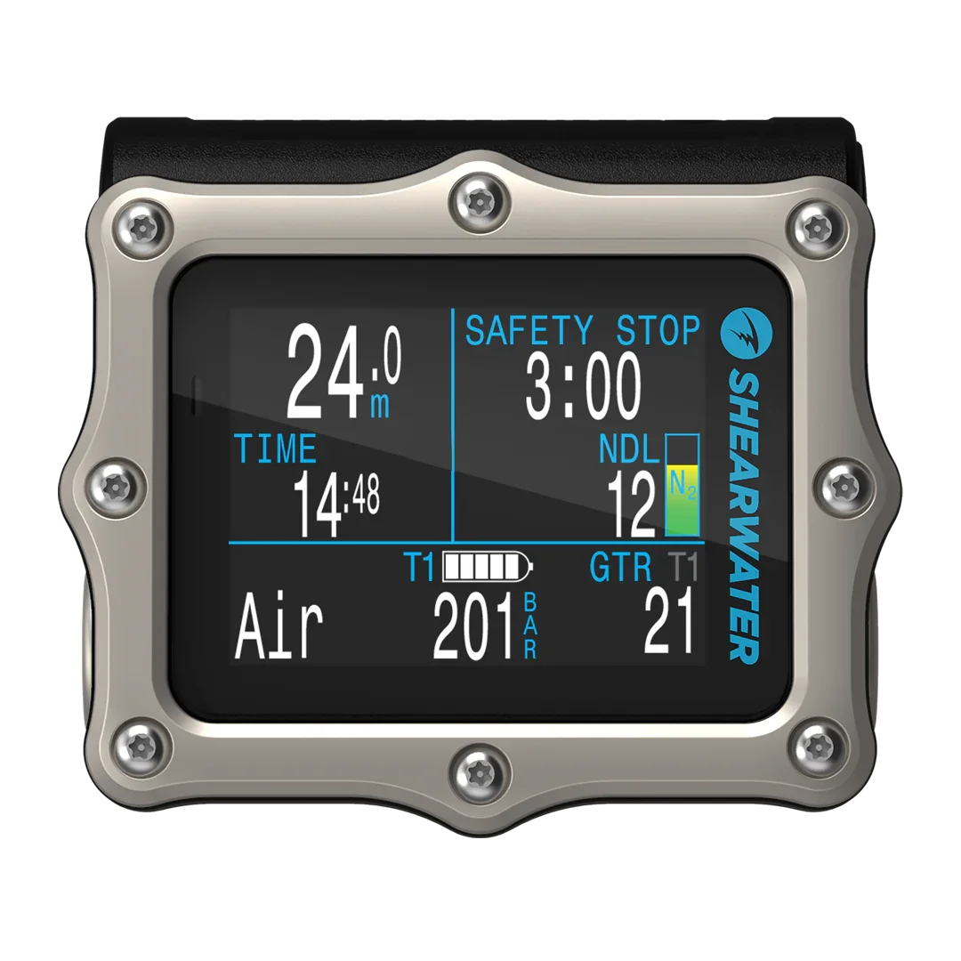 Diver's dive computer displaying 24 meters depth, 3 minutes safety stop, 14 hours and 48 minutes elapsed time, 12 Nitrogen loading, and tank pressure of 201 bar.