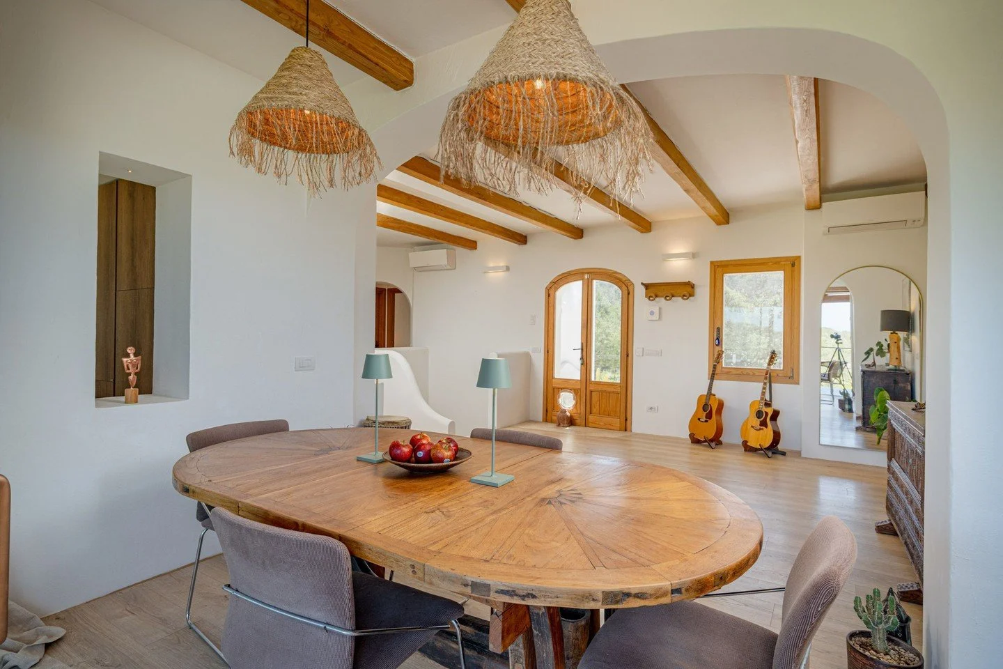 A slower table, a gentler stay.

This is where guests gather for breakfast, a quiet work hour, or an easy dinner before the light fades. The villa&rsquo;s shared spaces are designed for unhurried days, with room to settle in and feel at home.

Sacro 