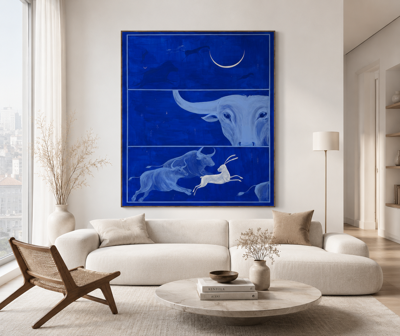 Keeper of Memory painting shown in a modern interior — large blue acrylic canvas with bull and hare above a sofa, interior scale reference by Jevgenia Vassiljeva