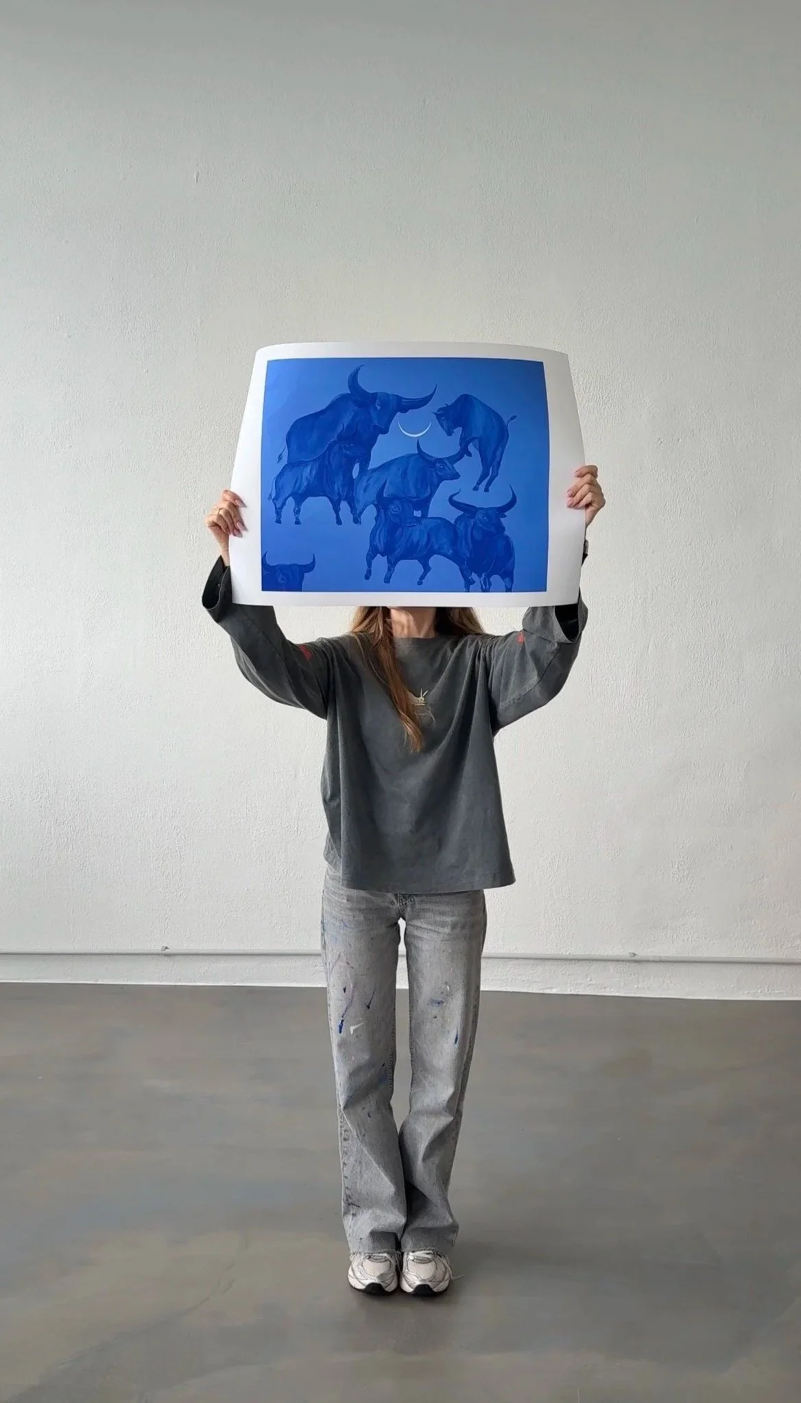 Still, We Return limited edition fine art print by Jevgenia Vassiljeva, 50 × 70 cm, featuring cobalt blue bulls and a moon