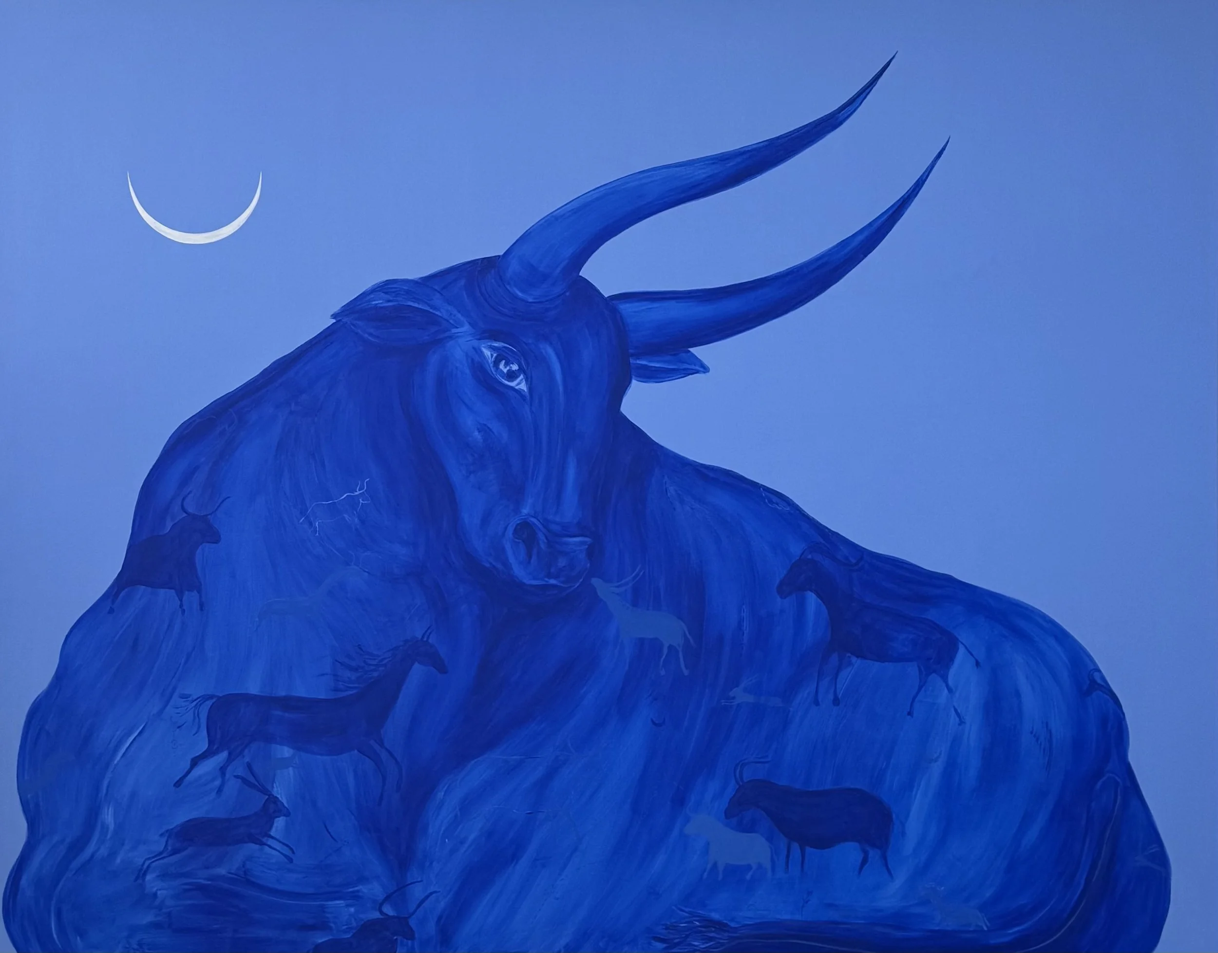 Mother of Pearl by Jevgenia Vassiljeva, a 190 × 150 cm blue acrylic painting featuring a monumental bull, crescent moon and hidden animal figures, shown in a contemporary interior.