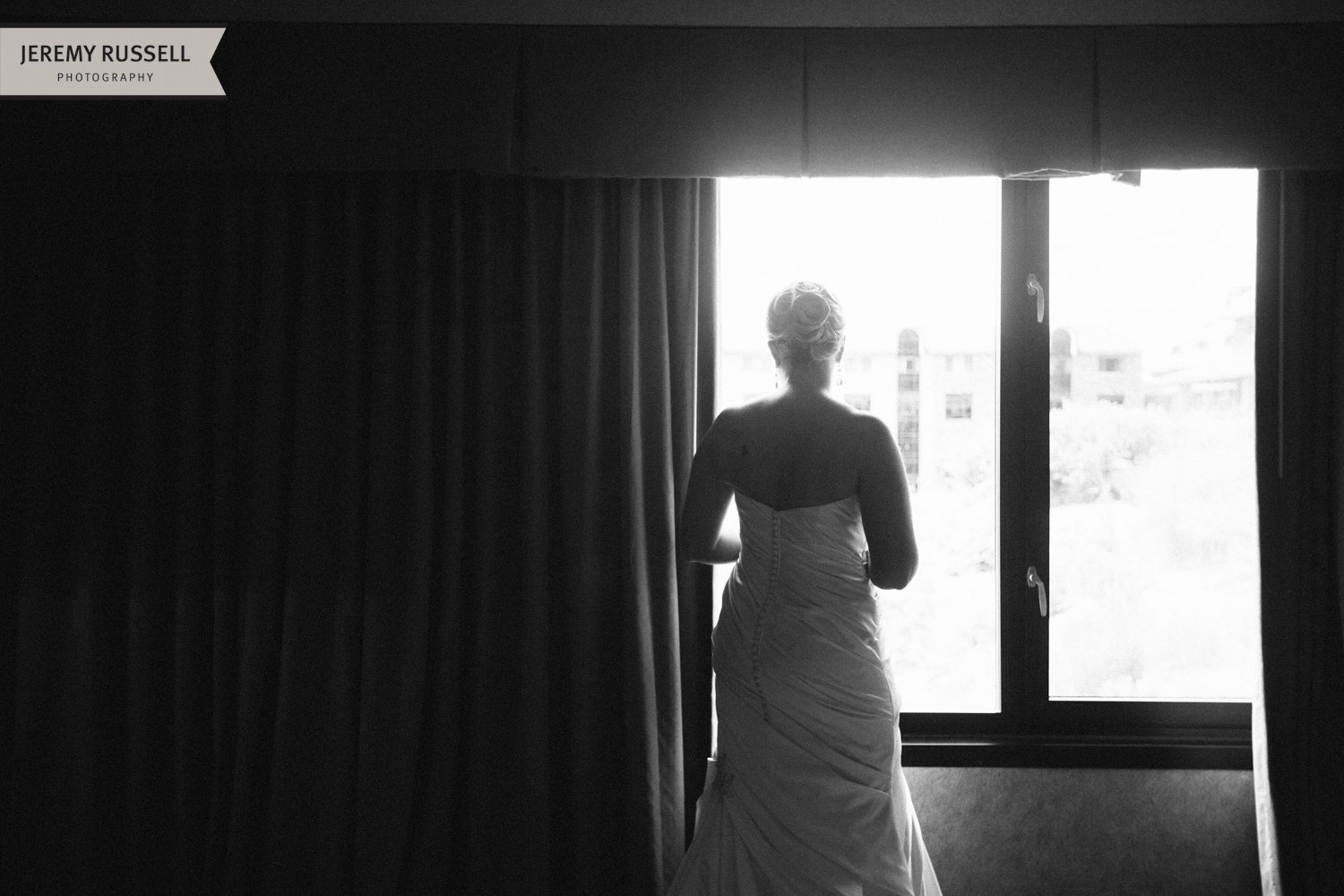 Bride at window. Grove Park Inn, Asheville, NC.