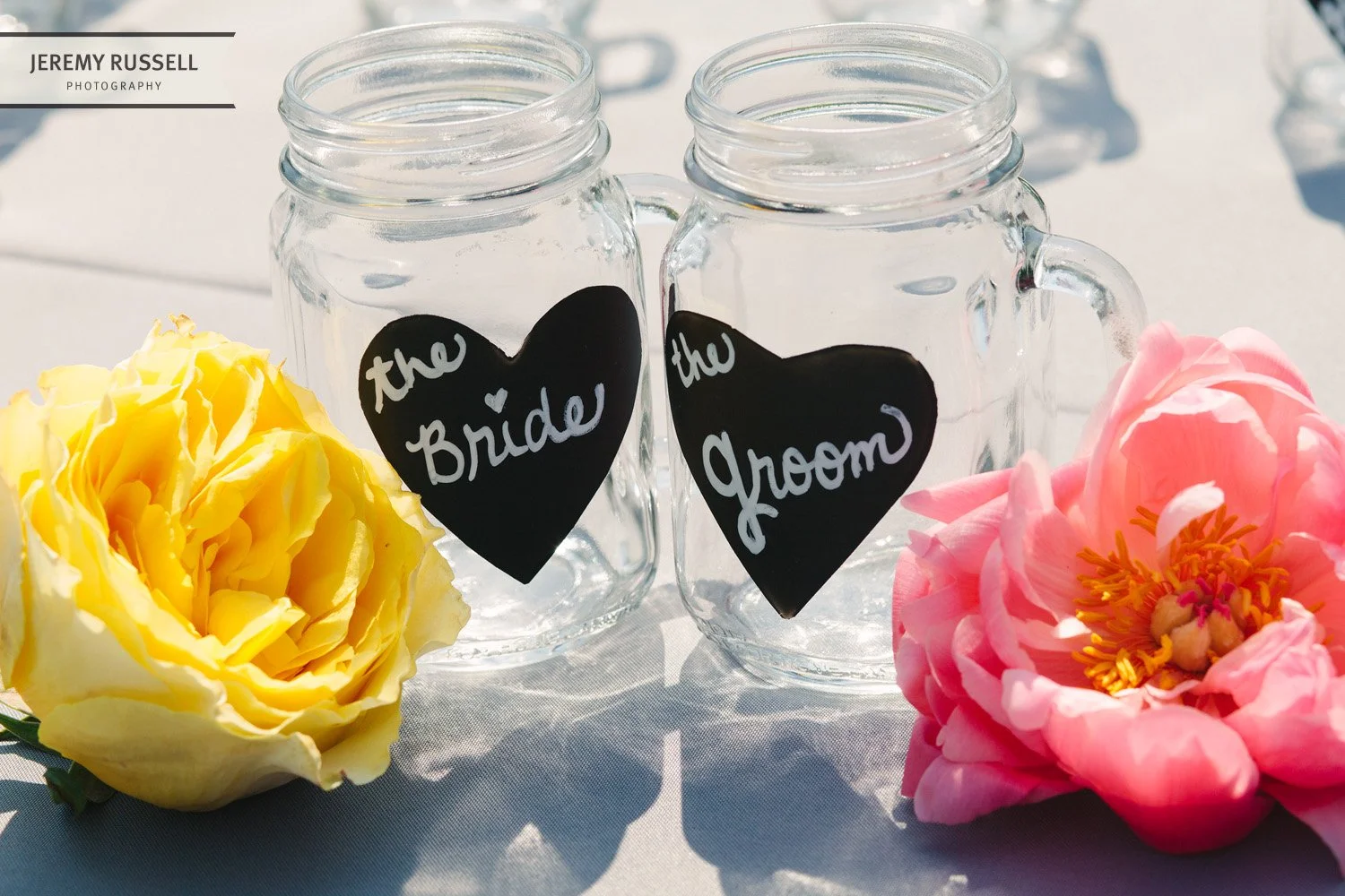 Bride and groom mason jars​