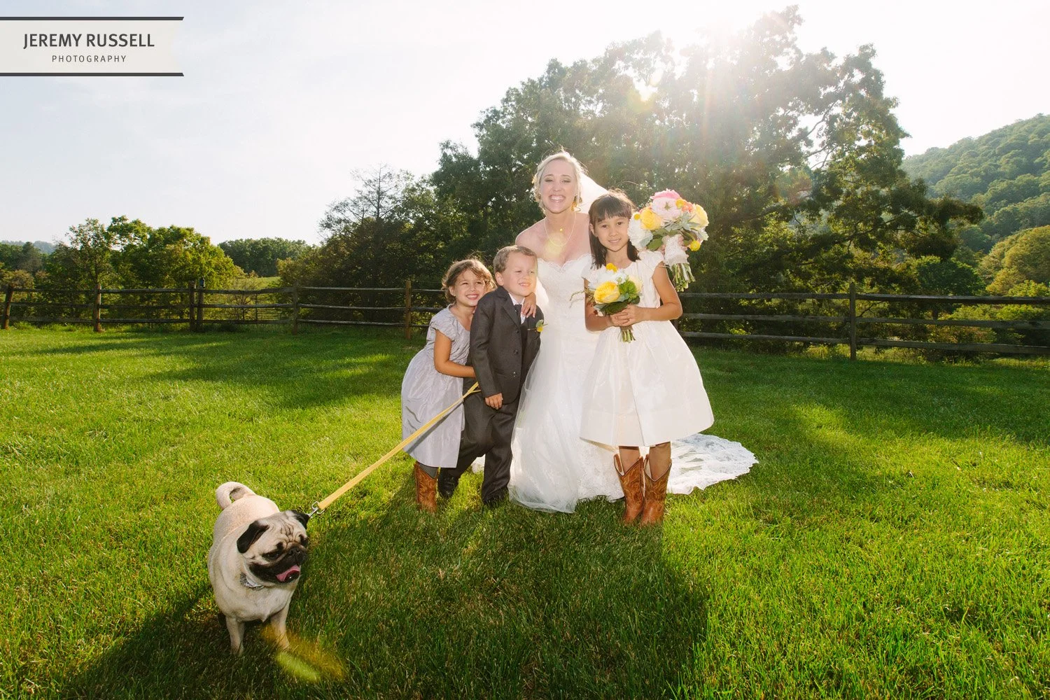 Bride with kids in field​