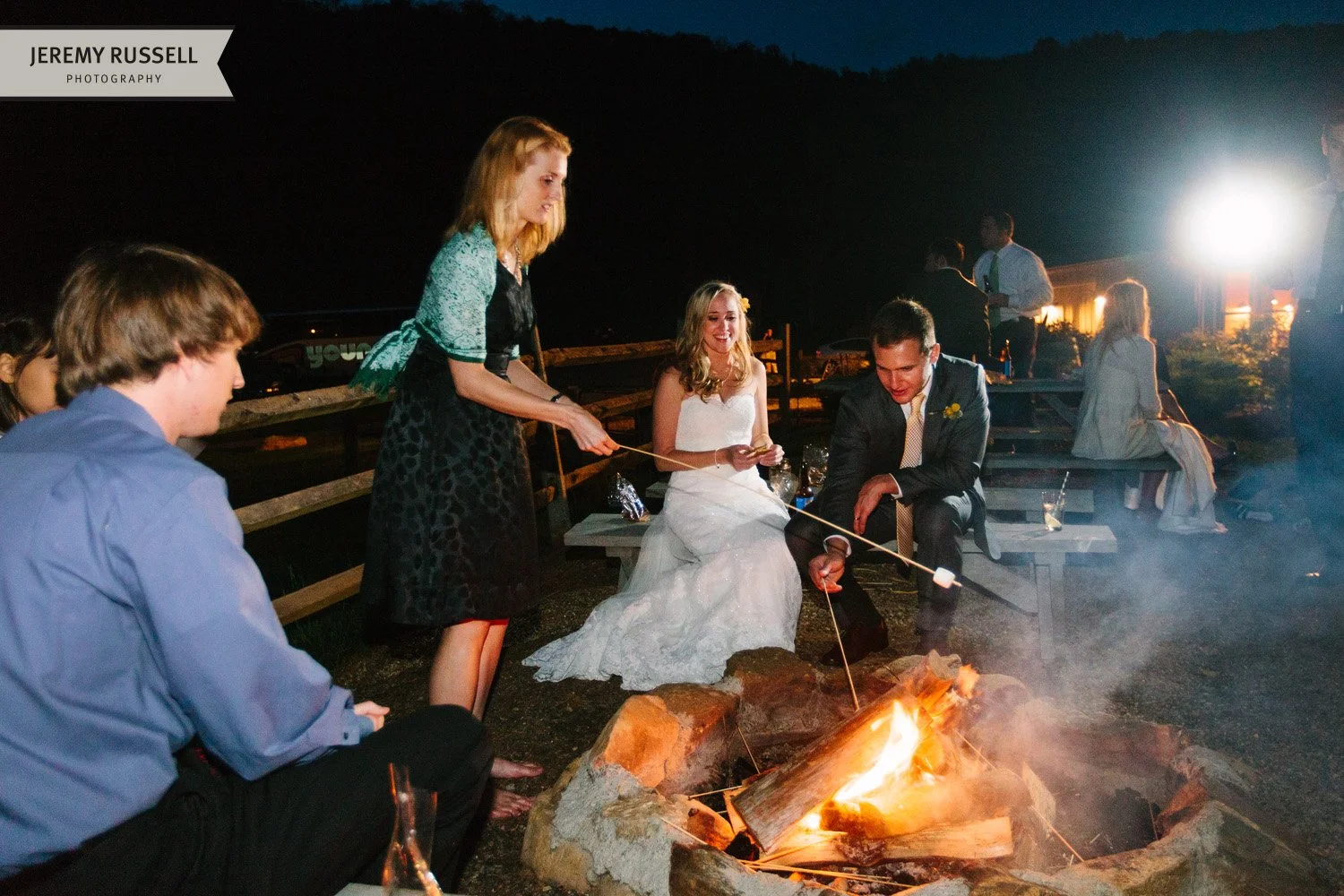 Bride and groom by Claxton Farm fire​