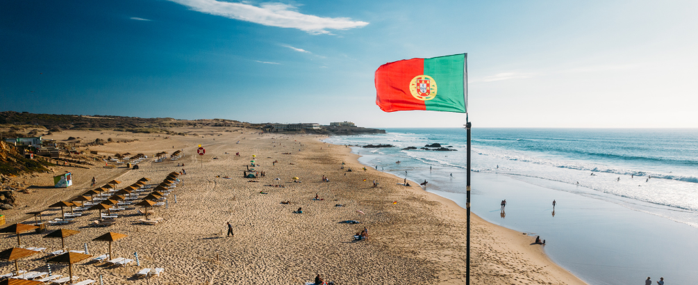 Portugal flag with beach in the background