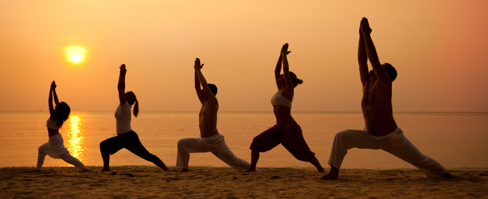Beach Yoga Group in the Sunset