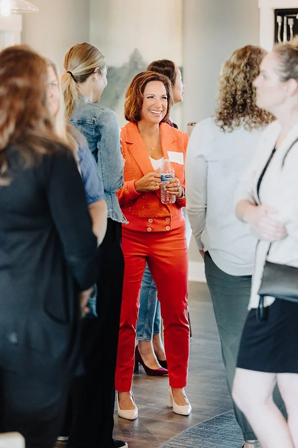 Andrea Liebross networking with women business owners at coaching event