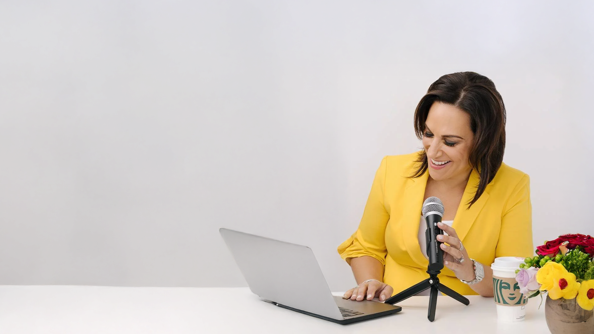 Andrea Liebross recording She Thinks Big podcast for women business owners