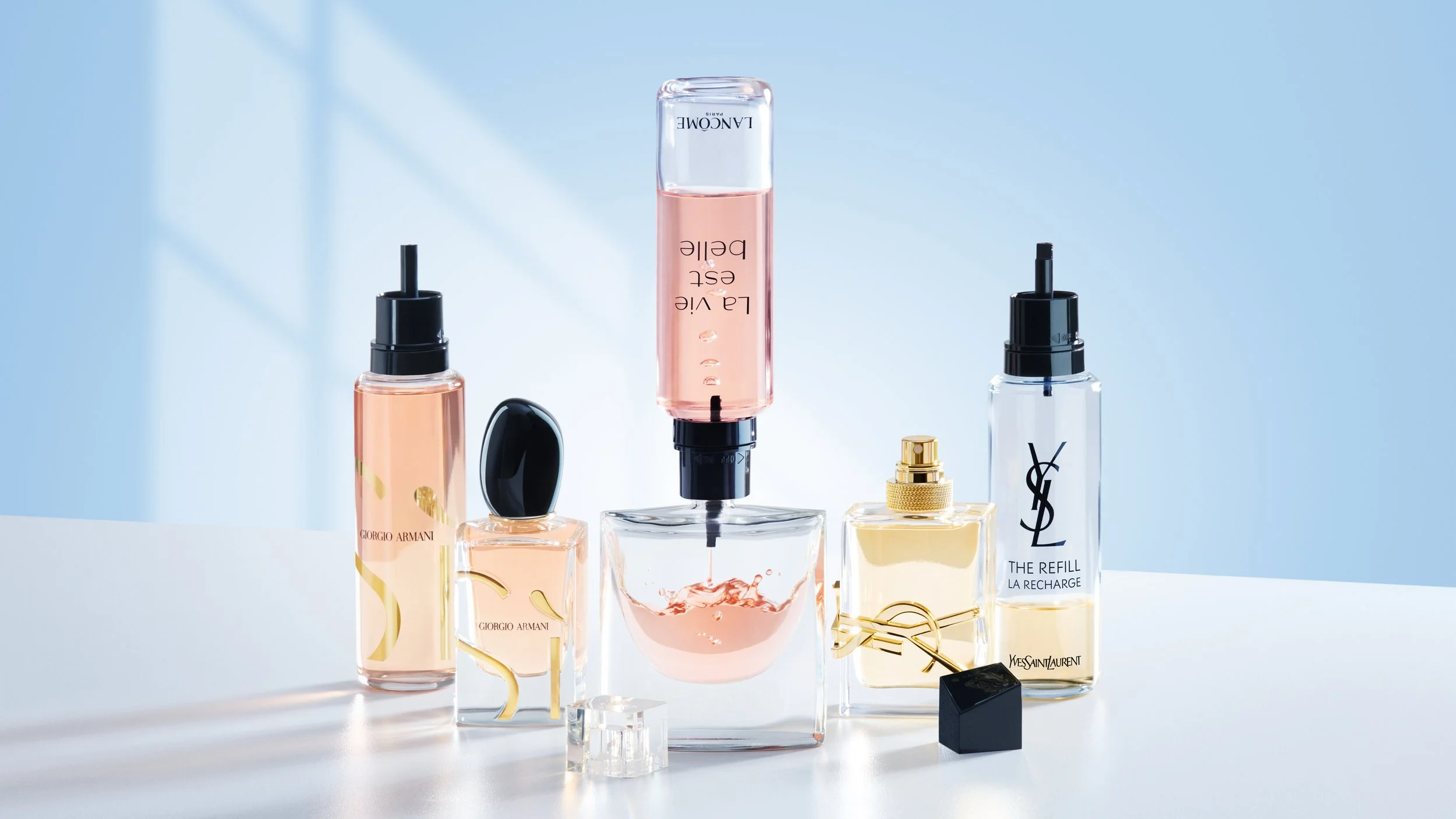 L'Oréal Luxe Campaign Refill _ Collection de plusieurs flacons de parfums de luxe (Giorgio Armani, Yves Saint Laurent, et Lancôme) avec leur flacon de refill