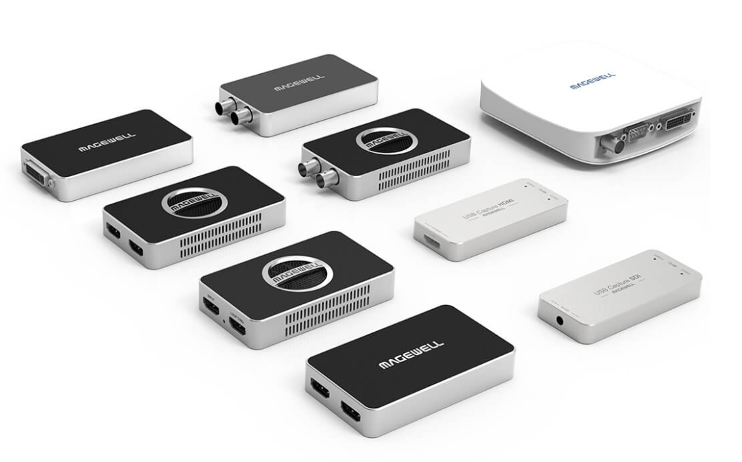 Collection of electronic devices including projectors, media players, and accessories from Magewell.