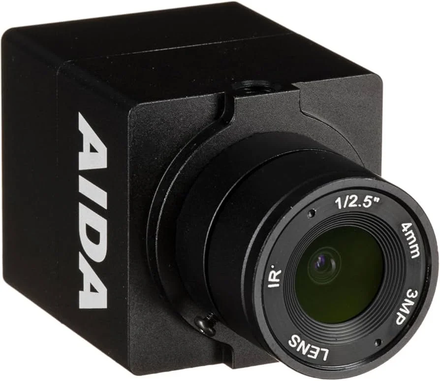 Black camera with lens labeled 1/2.5 inch, 4mm, IR, 3.DA, LENS.