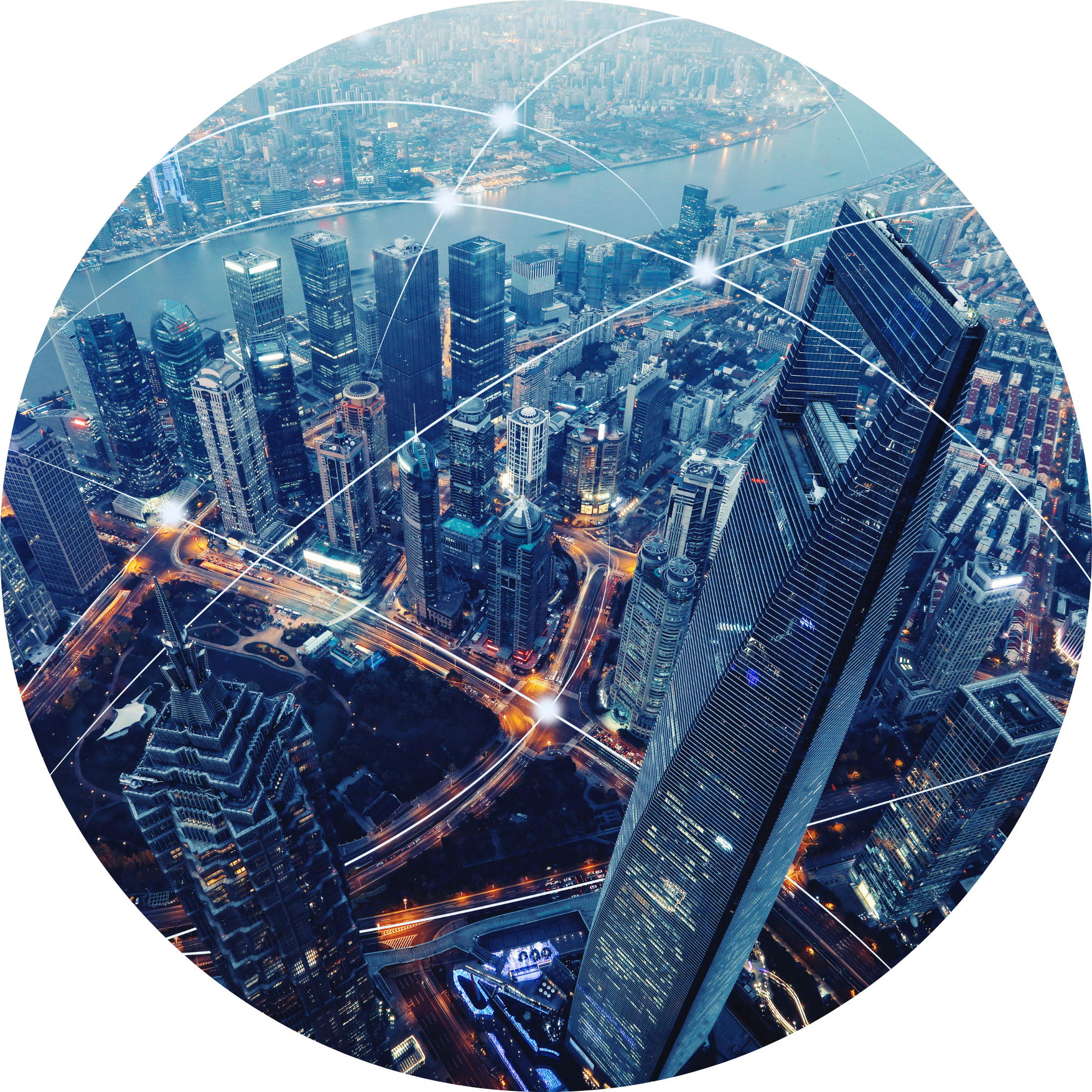 Aerial view of a city skyline at night with tall modern skyscrapers, a river, and streets illuminated with lights, overlaid with white lines and glowing points representing a digital network or connectivity.