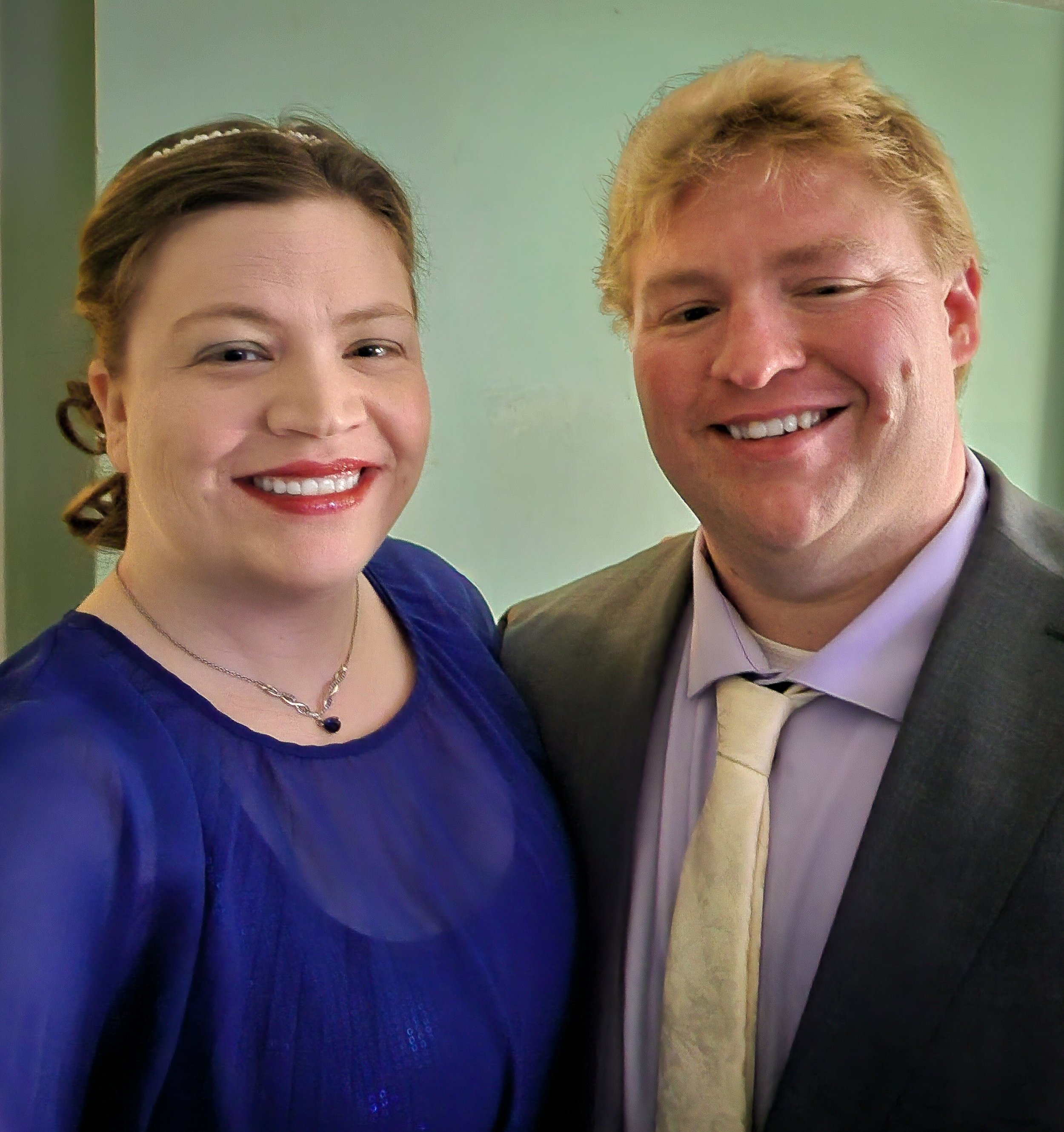 Bethany Lechlitner, owner of Lightkeepers Photography, and her husband at a formal event.
