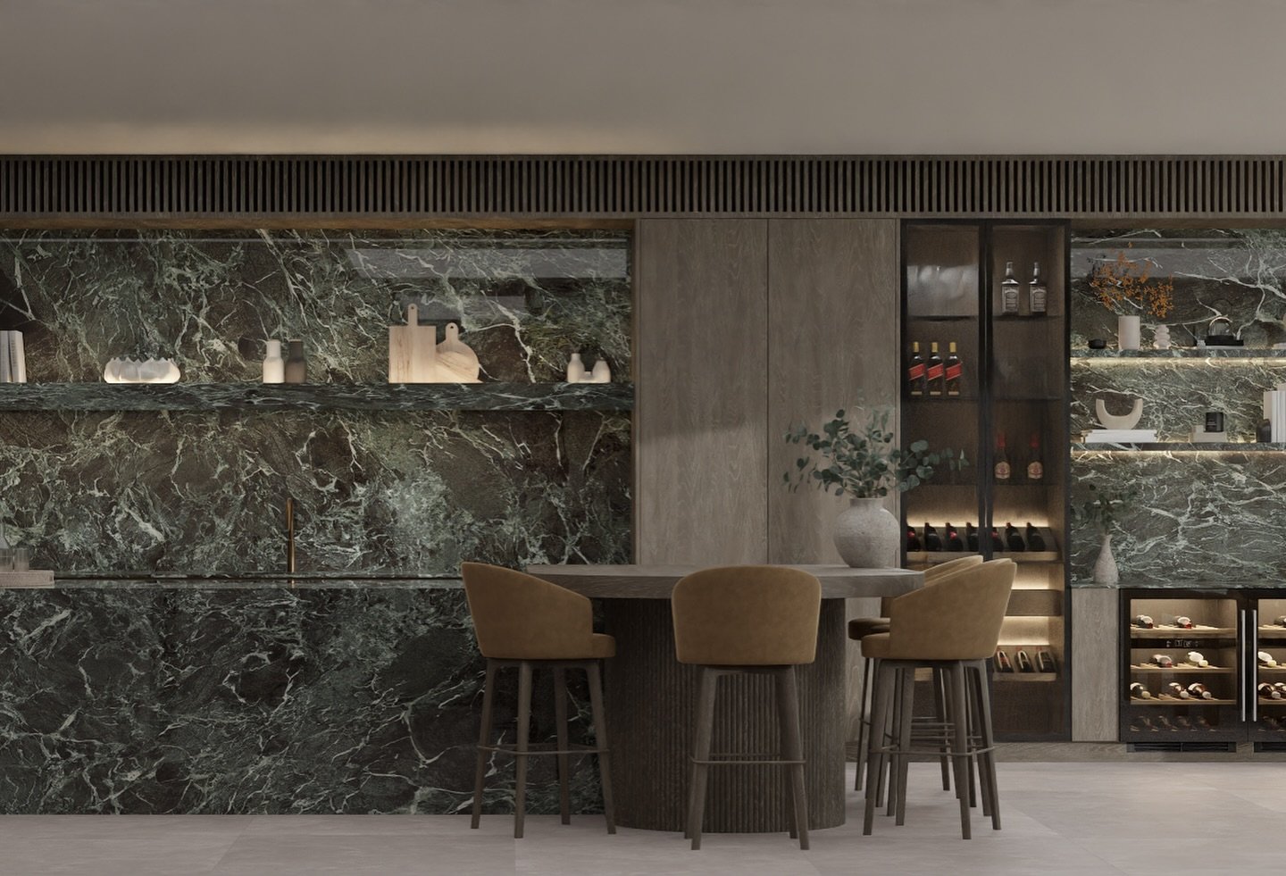 Modern kitchen with dark green marble backsplash and countertop, wooden cabinetry, glass wine storage, and a round wooden table with four beige chairs.
