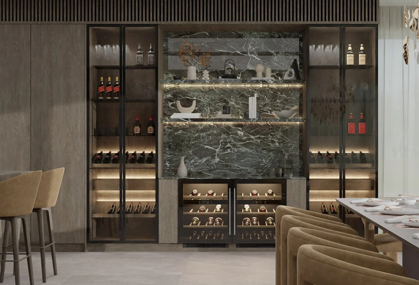 Interior of a modern, upscale dining room featuring a wine display and decorative shelves on a marble wall, with beige chairs and a dining table set with white dishes.