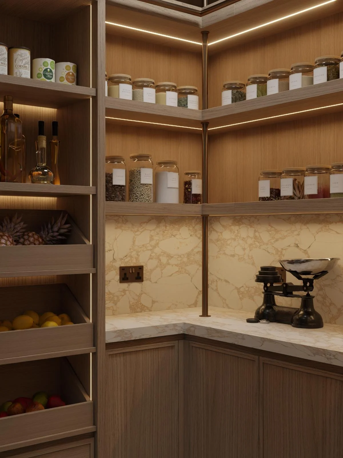 Wooden kitchen pantry with shelves of glass jars containing spices and grains, a vintage scale on marble countertop, and fresh fruits in drawers.