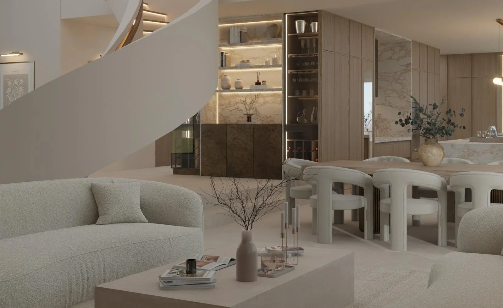 Modern living room with light-colored sofas, a coffee table with books and decorative items, a dining table with chairs, and a display shelf with vases and glassware, all in a neutral color palette.