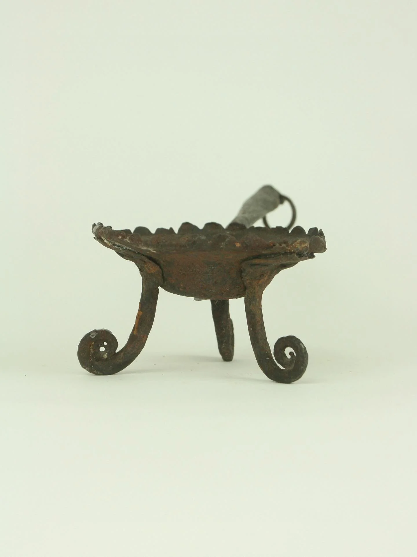 Wrought iron oil lamp