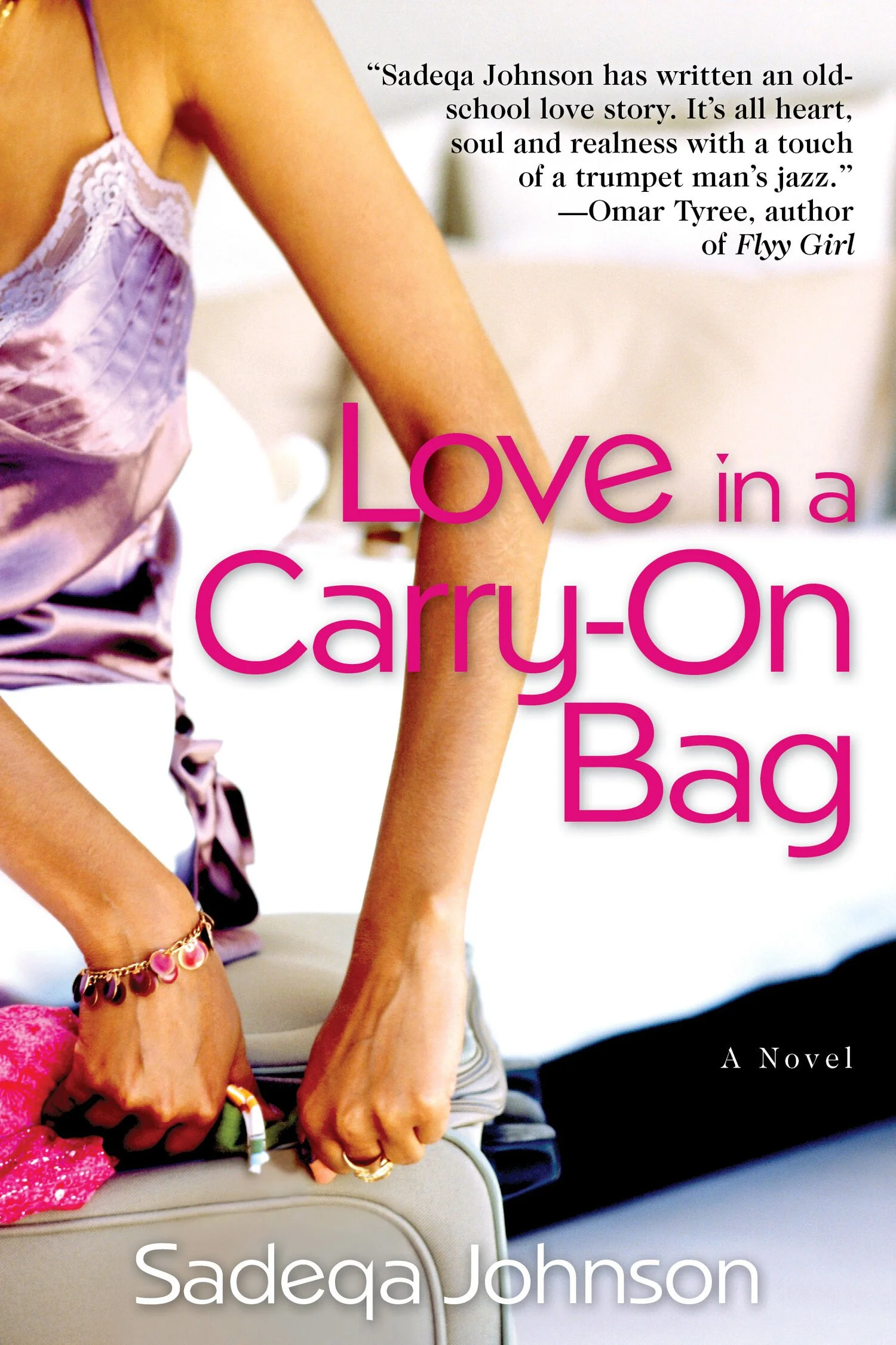 The book cover of "Love in a Carry-On Bag" by Sadeqa Johnson. It features a close-up of a woman’s arm and hand, holding a suitcase. The title is in large pink text, and there is a quote near the top right corner.