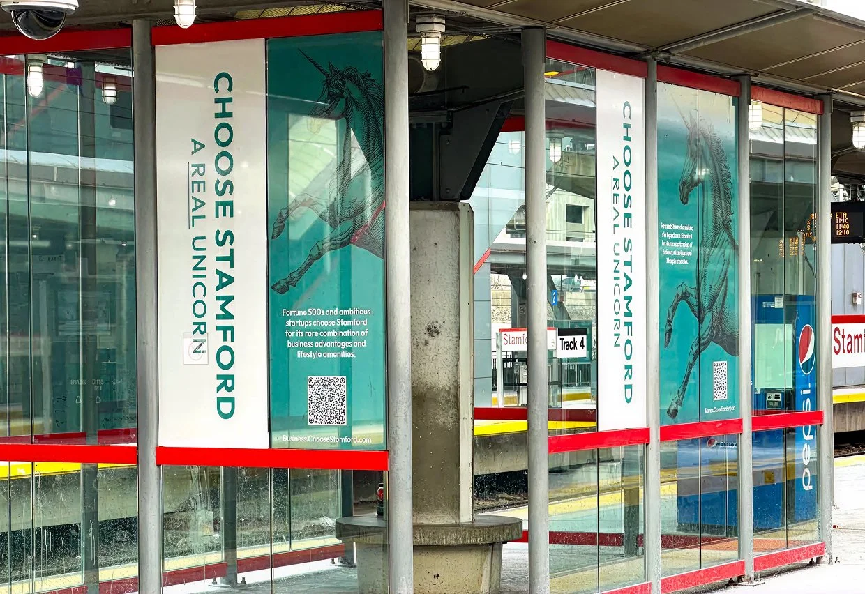 train station in stamford, unicorn campaign advertisement
