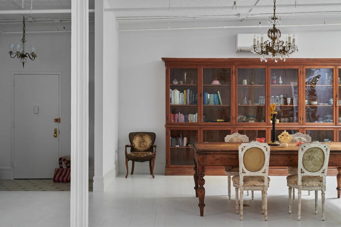 Restored details, original ceiling textures, and a wall of vintage cabinetry create a room that feels rooted and warm.
A mix of old and new, built with intention.

Architect &amp; Interior Designer: @studioofficina
Photographer: @hannagrankvist