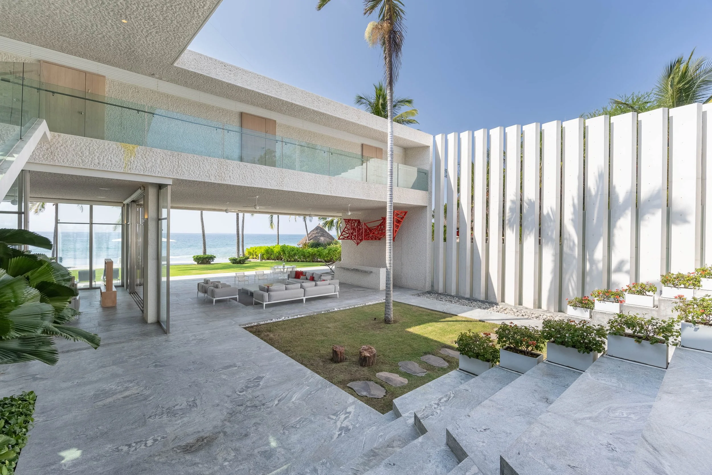 Modern beachfront house with outdoor living area Breeze punta de mita vacation rental villa 1