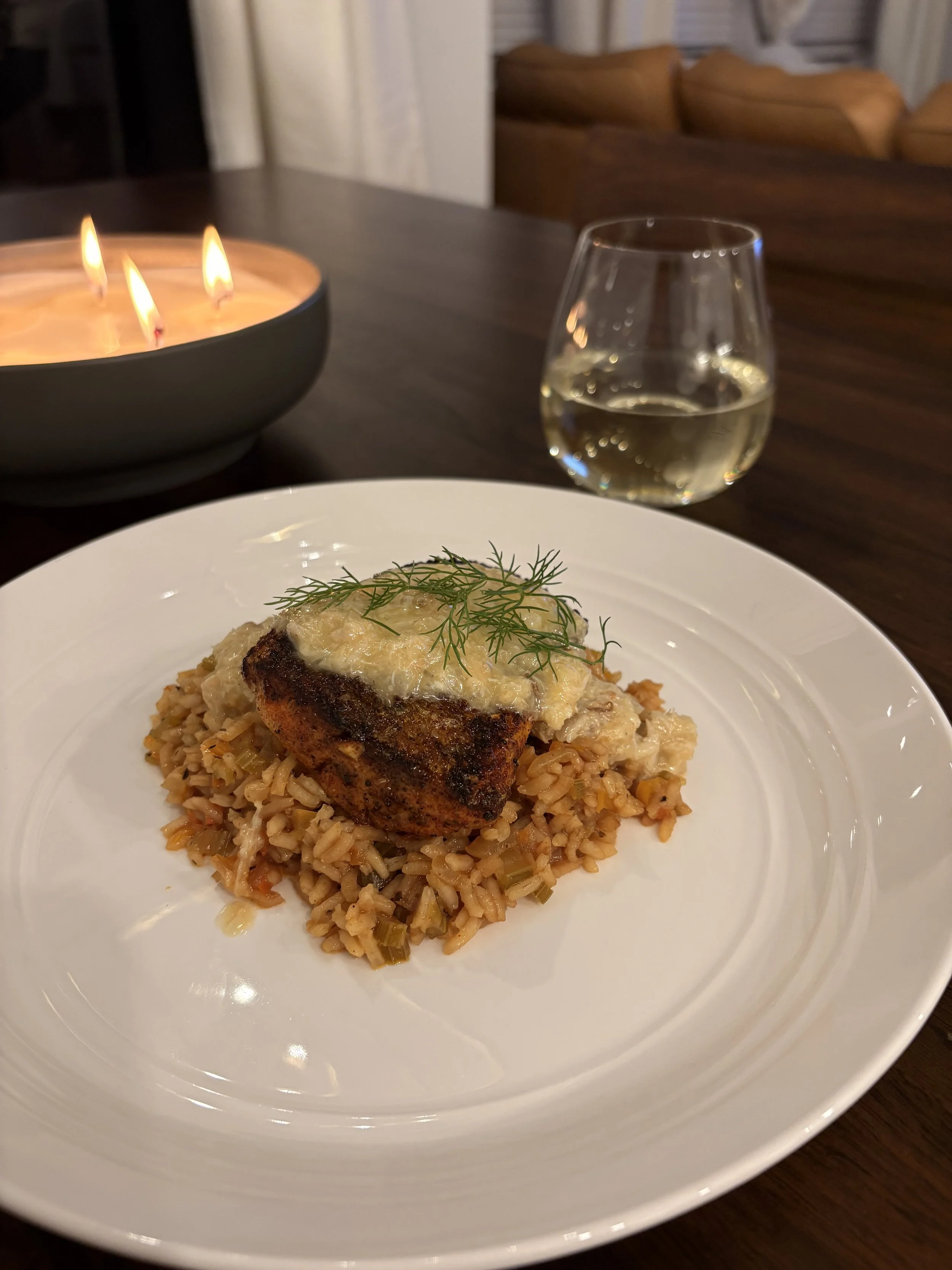 blackened redfish with dirty rice and crab beurre blanc