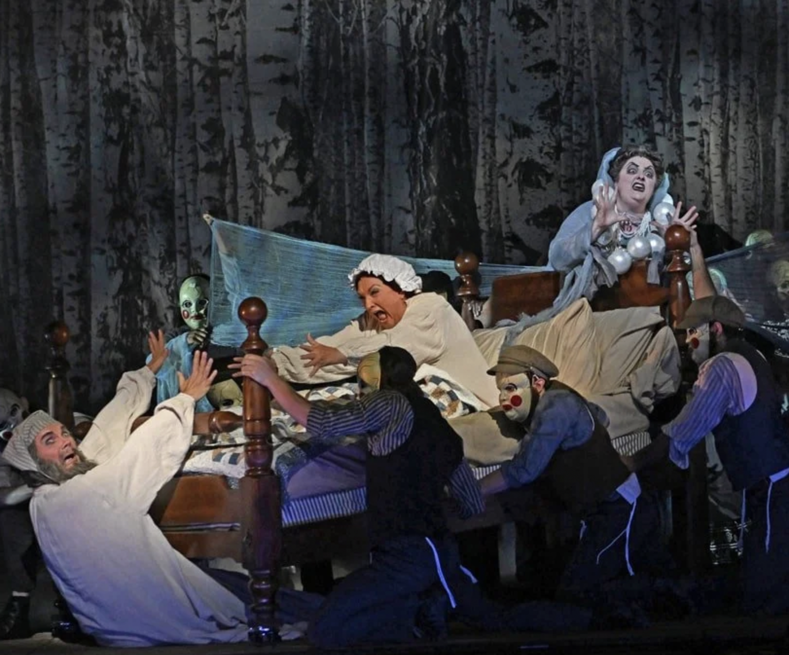 Pictured: Max Hopp, Victoria Livengood, Sarah Folsom, and members of the Cincinnati Opera Chorus